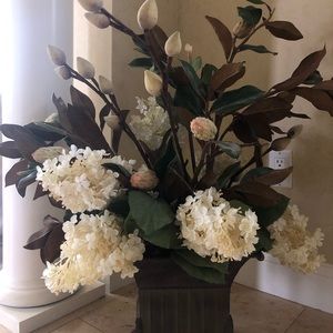 Fake flowers in beautiful metal box